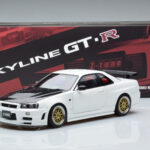 Nissan Skyline GT-R R34 Nismo Z-Tune Bílý MotorHelix 1:18 - image 11 of 11