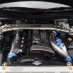 Nissan Skyline GT-R R34 Nismo Z-Tune Bílý MotorHelix 1:18 - image 9 of 11