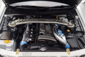 Nissan Skyline GT-R R34 Nismo Z-Tune Bílý MotorHelix 1:18 M83407 Kov – obrázek 9 z 11