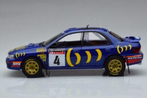 Subaru Impreza #4 C. McRae / D. Ringer Winner RAC Rally 1994 Kyosho 1:18 08962A Kov – obrázek 4 z 9