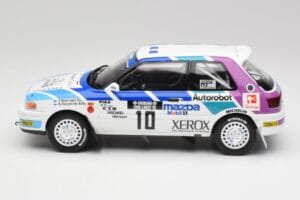 Mazda 323 GTX #10 T. Makinen / S. Harjanne 1000 Lakes Rally 1991 Otto 1:18 OT1099 Pryskyřice – obrázek 3 z 6