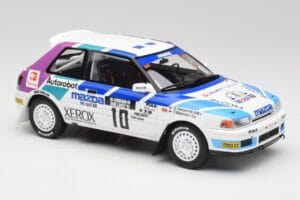 Mazda 323 GTX #10 T. Makinen / S. Harjanne 1000 Lakes Rally 1991 Otto 1:18 OT1099 Pryskyřice – obrázek 4 z 6