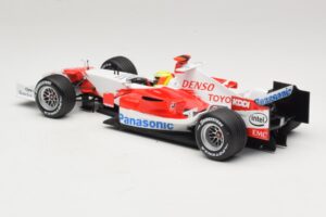 Panasonic Toyota Racing TF106 #12 R. Schumacher Presentation 2006 Minichamps 1:18 AM59553G Kov – obrázek 5 z 6