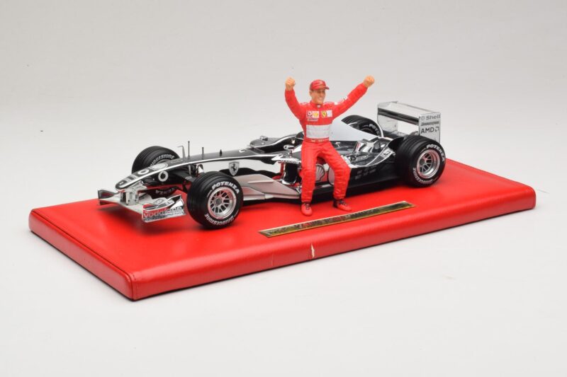 Ferrari F2004 #1 M. Schumacher Six Time World Champion 2004 Chrom Stříbrná Hot Wheels 1:18 C7332 Kov