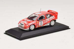 Ford Escort Cosworth Toshiba #11 A. Vatanen / Freeman 1994 Minichamps 1:43 430981811 Kov – obrázek 2 z 4